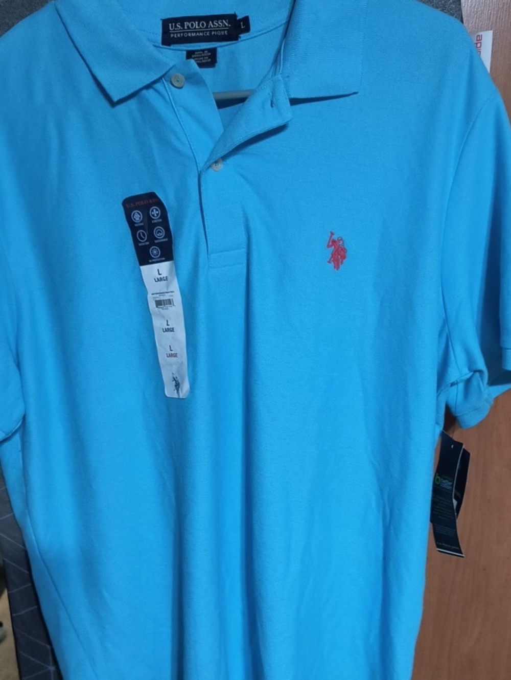 U.S. Polo Assn. Men’s Bright Turquoise Polo with Red Logo